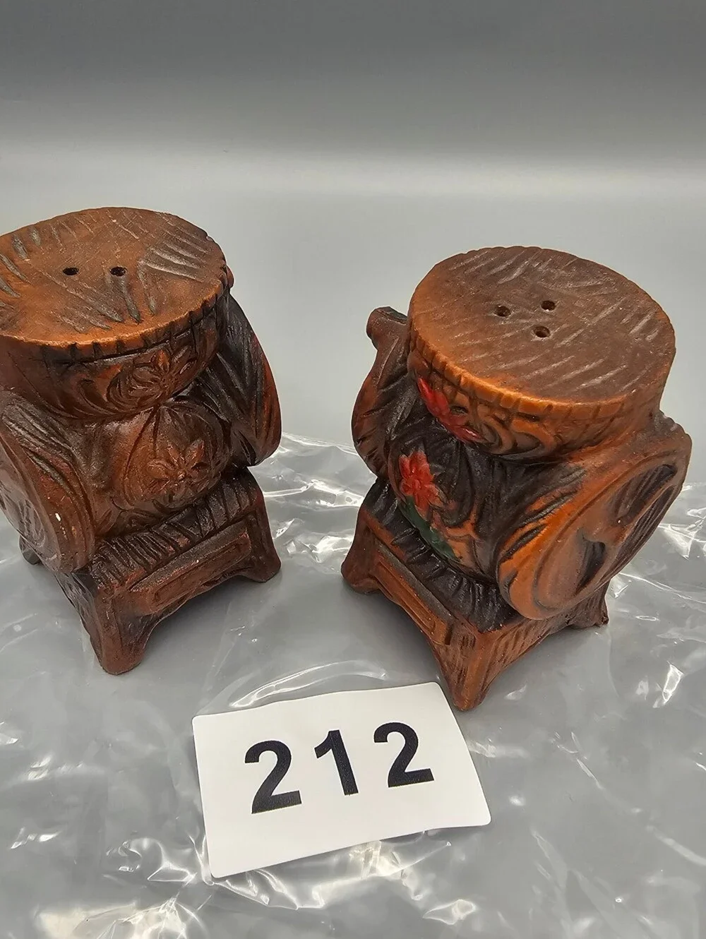 Vintage Hand-Carved Wooden Salt and Pepper Shakers with Floral Design